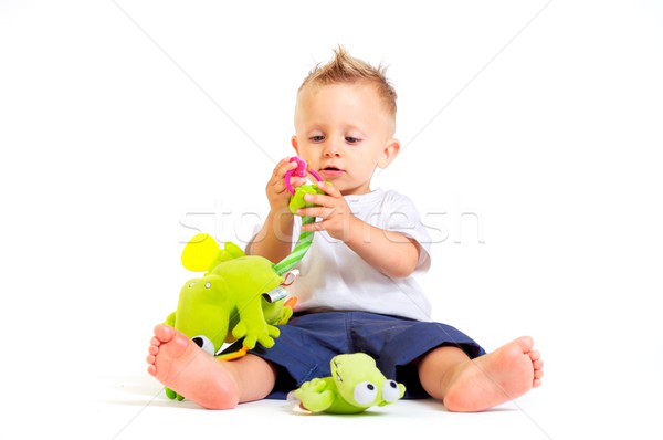 Baba játékok egyéves fiú játszik stúdiófelvétel Stock fotó © nyul