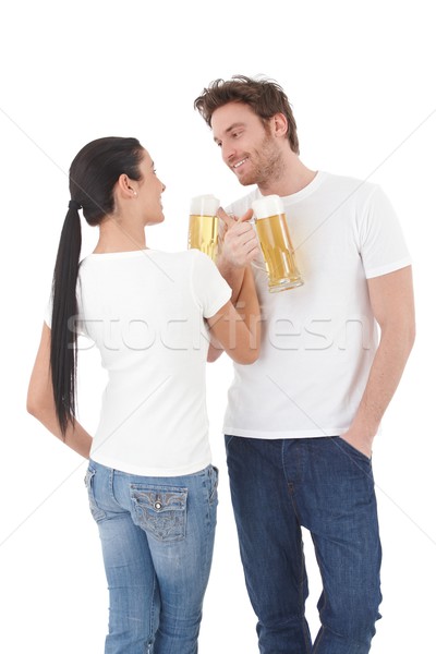 Young couple drinking beer having fun smiling Stock photo © nyul