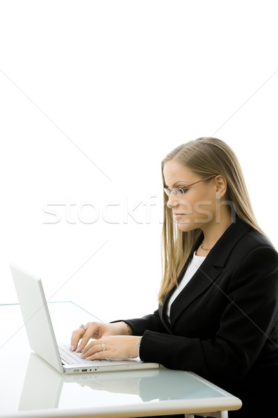 Businesswoman working on laptop Stock photo © nyul