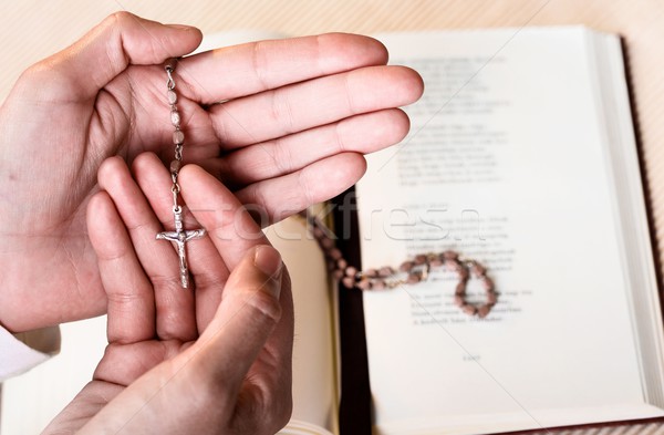 Rosary in hand Stock photo © nyul