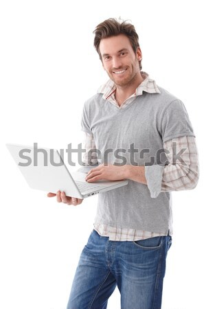 Csinos üzletasszony dolgozik tart laptop kezek Stock fotó © nyul
