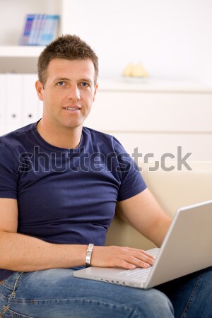 Man using laptop Stock photo © nyul