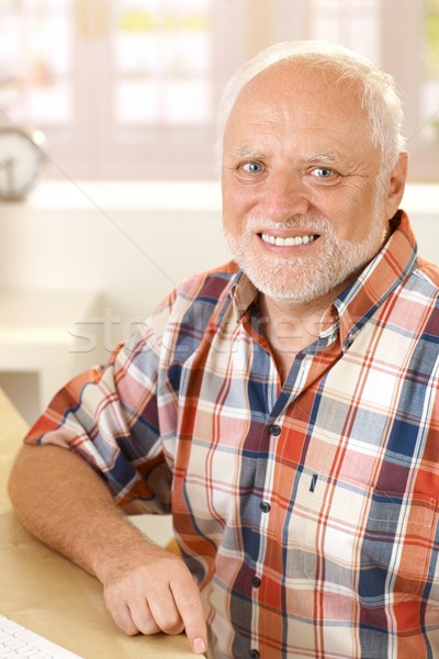 Portrait of smiling senior man Stock photo © nyul