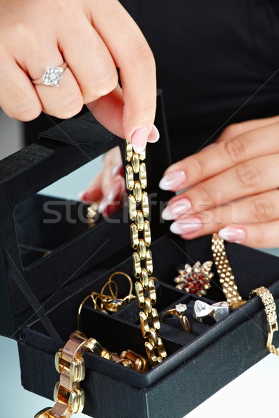 Female hand holding bracelet Stock photo © nyul