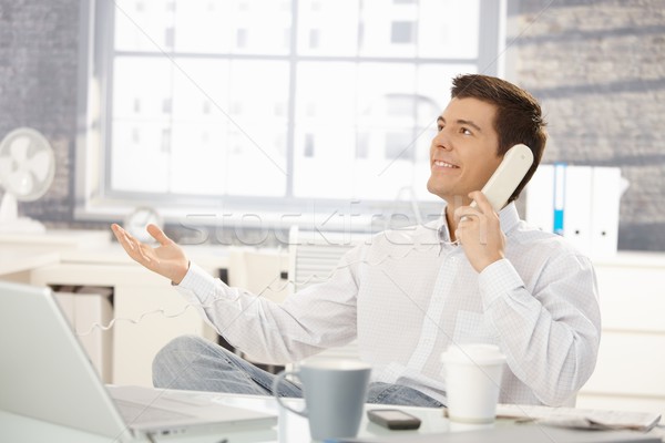 Stock photo: Businessman in office on phone call
