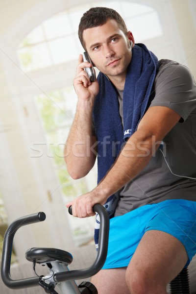 Man talking on mobile after training Stock photo © nyul