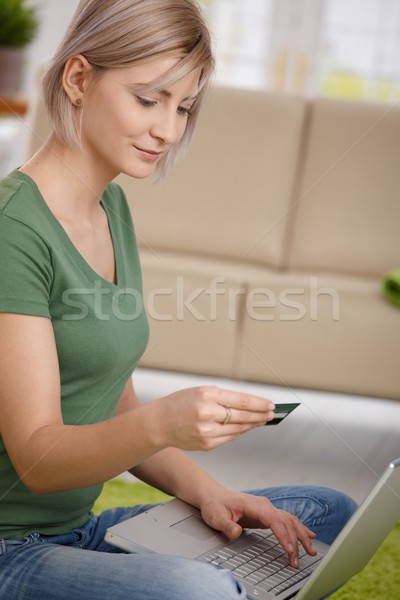 Woman paying online with credit card Stock photo © nyul