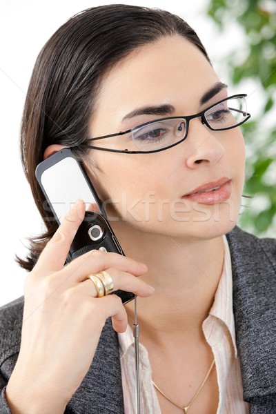 Vrouw praten mobiele portret aantrekkelijk Stockfoto © nyul