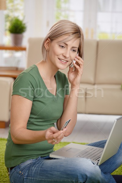 Woman paying bills from home Stock photo © nyul