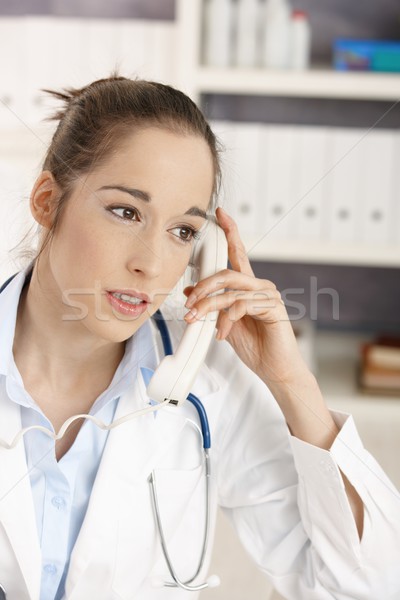 Female doctor on the phone Stock photo © nyul