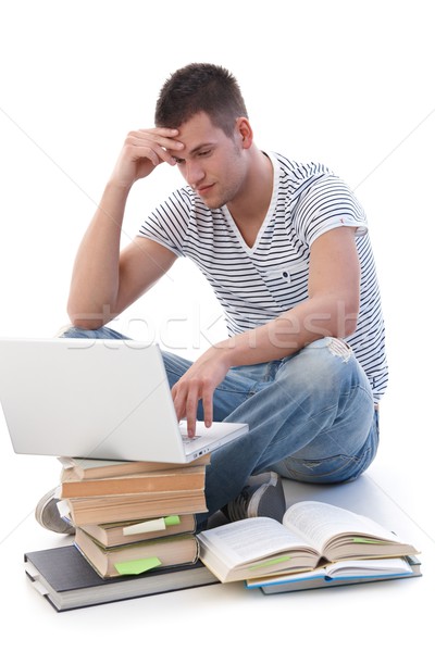 College student doing homework on laptop Stock photo © nyul