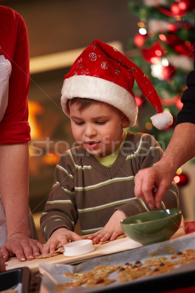 Piccolo ragazzo babbo natale Hat Natale cottura Foto d'archivio © nyul