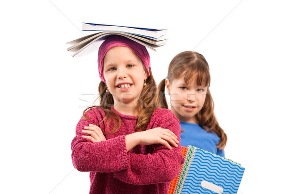 Stockfoto: Schoolkinderen · portret · meisjes · glimlachend · camera · balancing