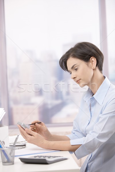 商業照片: 女實業家 · pda · 辦公室 · 坐在 · 業務