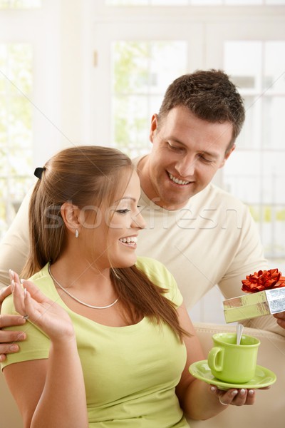 Homme surprenant femme séance salon potable [[stock_photo]] © nyul