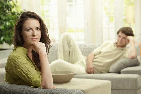 [[stock_photo]]: Couple · maison · canapé · mise · au · point · sélective