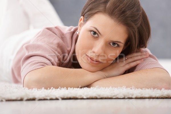Attractive woman lying on floor Stock photo © nyul