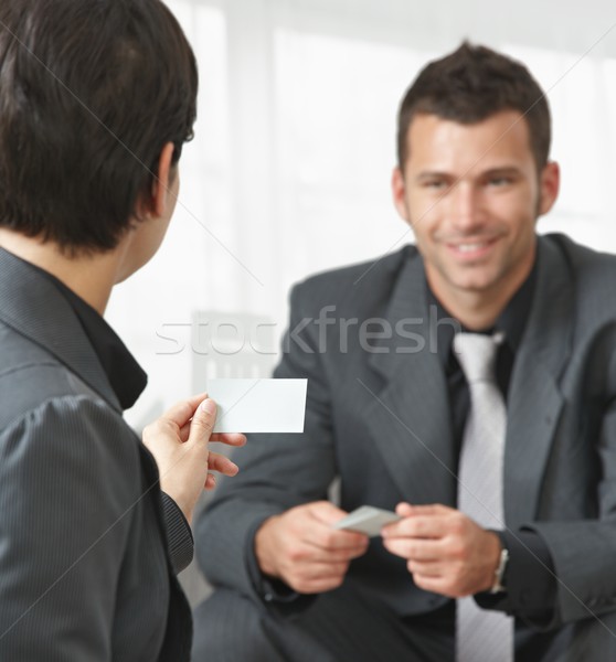 Business people changing cards Stock photo © nyul