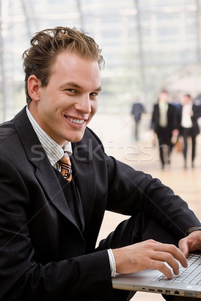 бизнесмен рабочих ноутбука портативного компьютера служба лобби Сток-фото © nyul