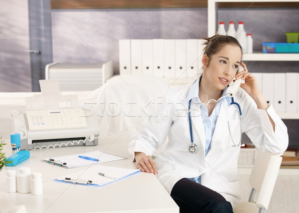 Female doctor on the phone Stock photo © nyul