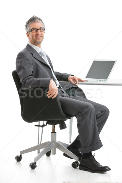 Businessman sitting at desk Stock photo © nyul