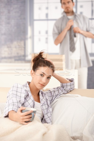 Jonge vrouw drinken ochtend thee bed jonge Stockfoto © nyul