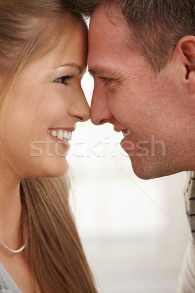 Happy couple smiling Stock photo © nyul