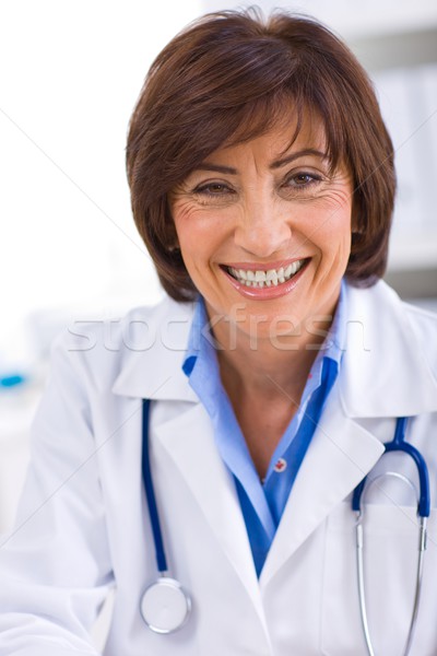 Female doctor working at office Stock photo © nyul