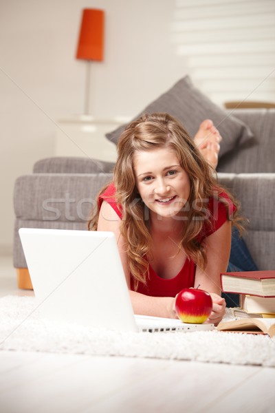 [[stock_photo]]: Fille · heureuse · portable · heureux · adolescente · étage · souriant