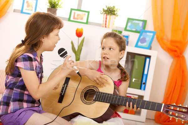 Girls playing music and singing Stock photo © nyul