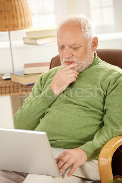 Senior man working on computer at home Stock photo © nyul