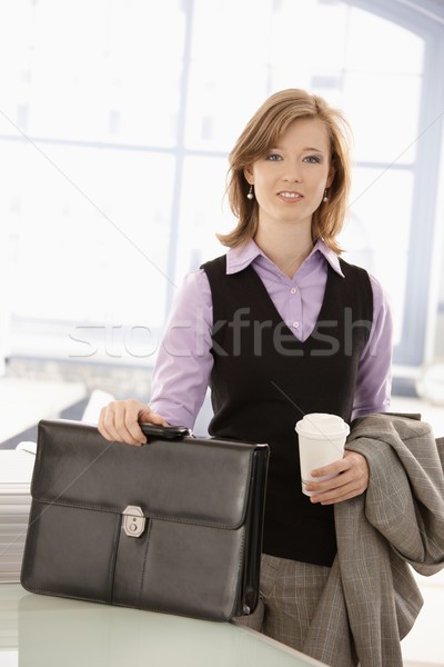Young businesswoman arrived to office Stock photo © nyul