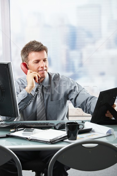 Happy businessman on phone calling family Stock photo © nyul