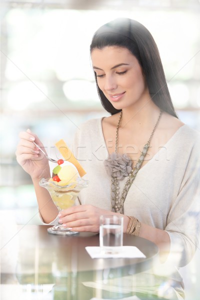 Güzel kadın buz dondurma oturma tablo Stok fotoğraf © nyul