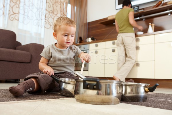 Little boy playing in kitchen Stock photo © nyul