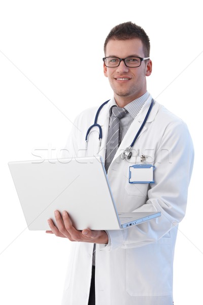 Zdjęcia stock: Wesoły · młodych · lekarza · laptop · strony