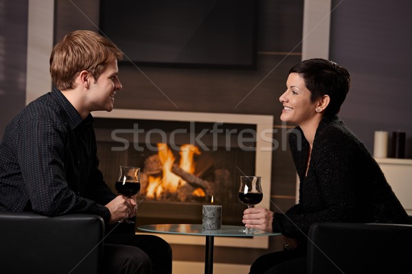 Romantik çift kalma genç oturma şömine Stok fotoğraf © nyul