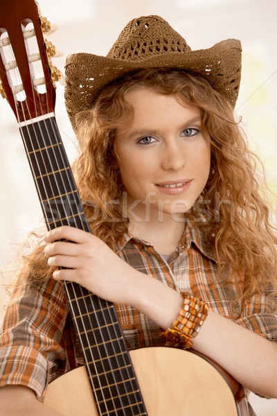 Attractive female hugging guitar Stock photo © nyul