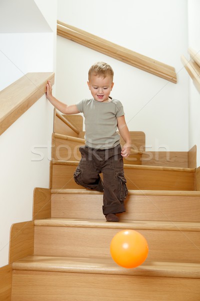 Little boy playing on stairs Stock photo © nyul