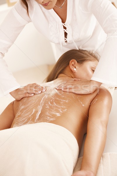 Kobieta masażu masażysta krem powrót Zdjęcia stock © nyul