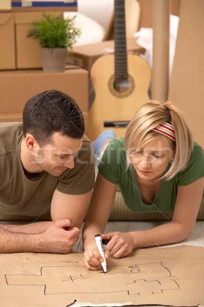 Young couple planning their new home Stock photo © nyul