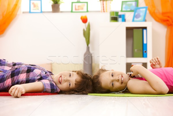 Portrait of young girls enjoying music Stock photo © nyul