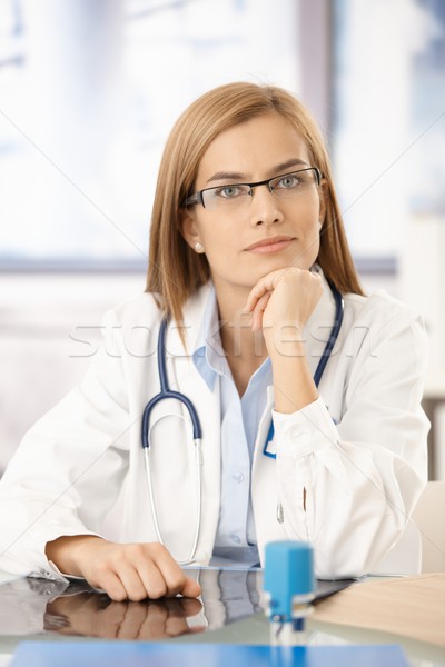 молодые медик сидят столе служба улыбаясь Сток-фото © nyul