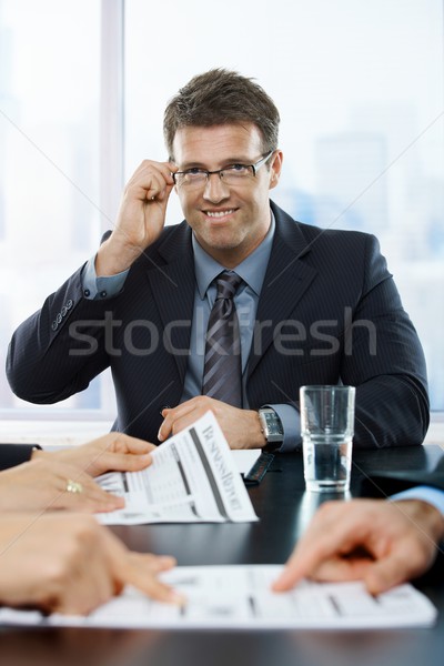 Successful businessman smiling Stock photo © nyul