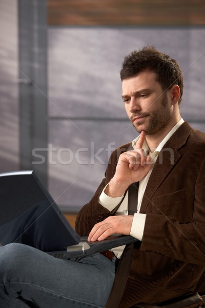 Troubled man with laptop Stock photo © nyul
