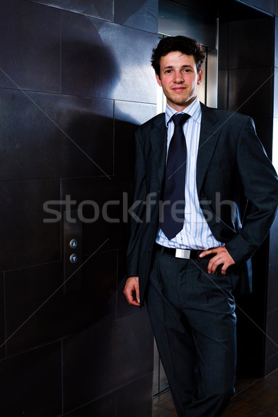 Işadamı ofis genç mutlu ayakta asansör Stok fotoğraf © nyul