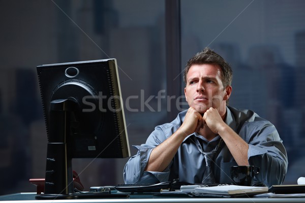 Determined businessman concentrating Stock photo © nyul