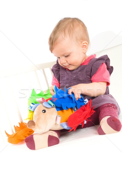 Baby playing with soft toy Stock photo © nyul