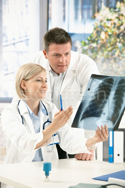 Medical team discussing x-ray image Stock photo © nyul