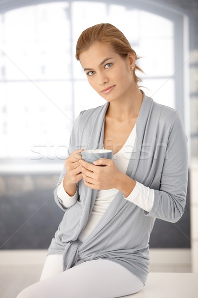 Portrait of pretty woman with tea mug Stock photo © nyul